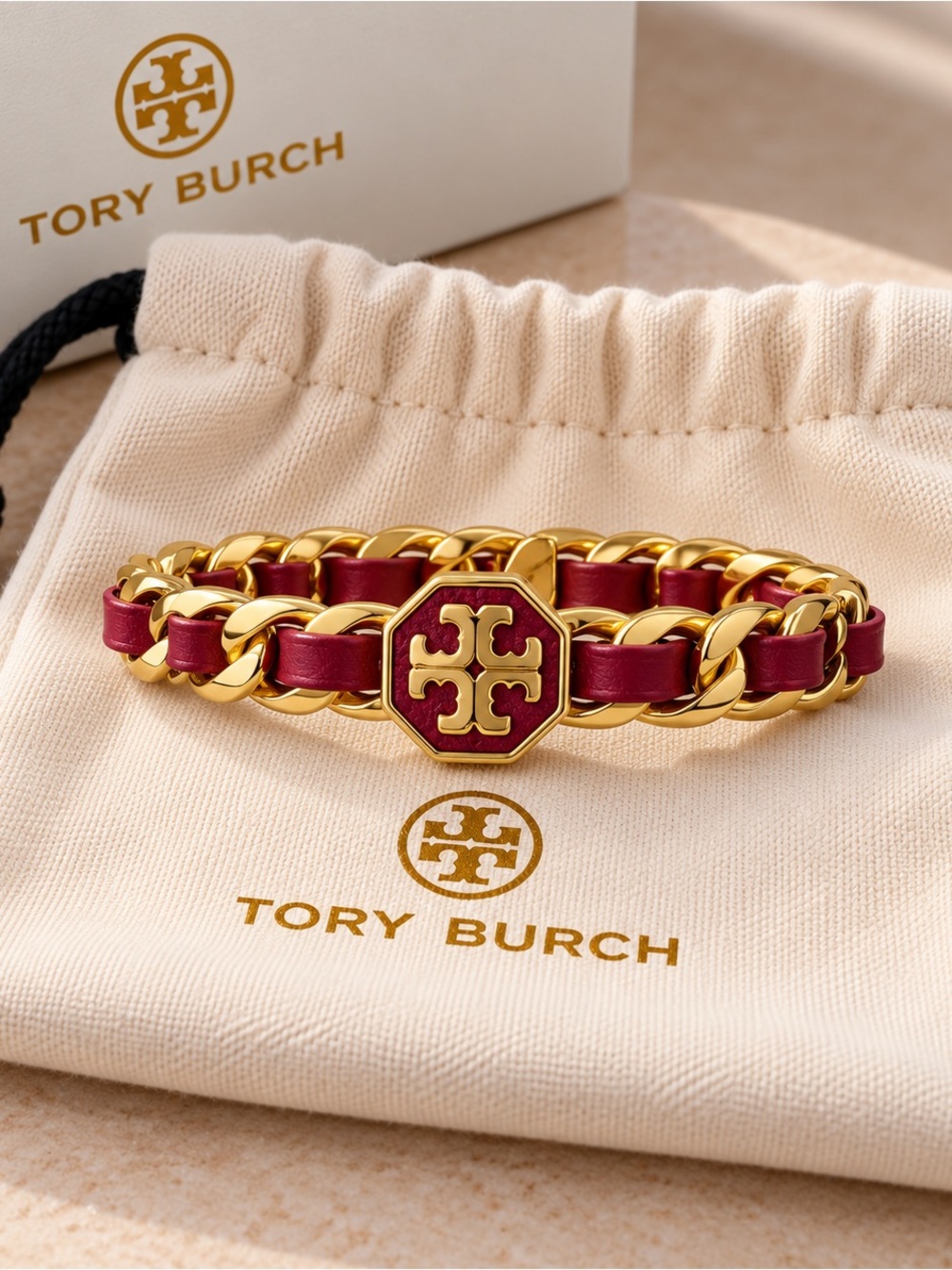 Tory Burch Gold-Tone Chain Bracelet open with Burgundy Leather Inlay